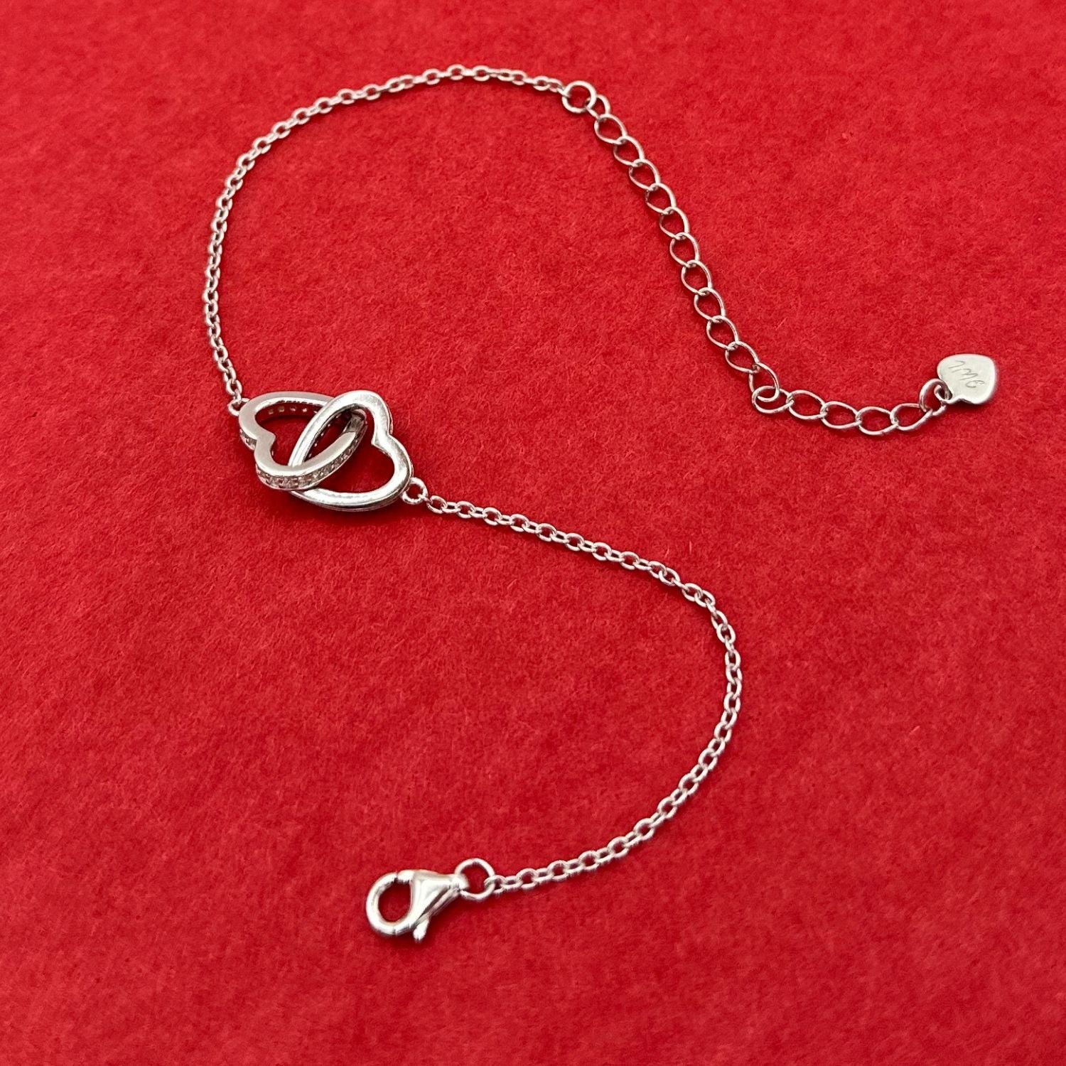 Interlocking Silver Hearts Bracelet - Rhodium Finish